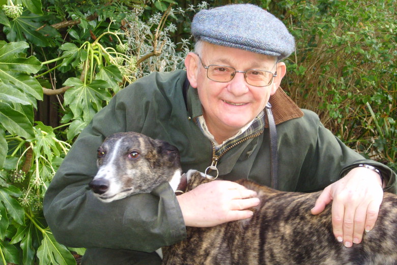 Lord David Lipsey and brindle greyhound